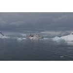 Boat in Neko Harbor, Antarctica. Photo by Adam Riley. All rights reserved.