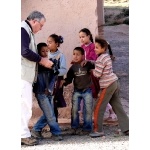 Alan showing them digital photos. Photo by Rick Taylor. Copyright Borderland Tours. All rights reserved. 