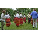 A few Borderlanders join the Women's Co-op Dancers at Gorilla Forest Camp. Photo by Dave Semler and Marsha Steffen. All rights reserved.