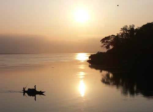 Brahmaputra river at dawn. Photo by Rick Taylor. Copyright Borderland Tours. All rights reserved. 201