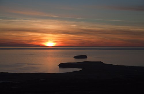 Tjornes midnight sun over grimsey island-gunnar johannesson